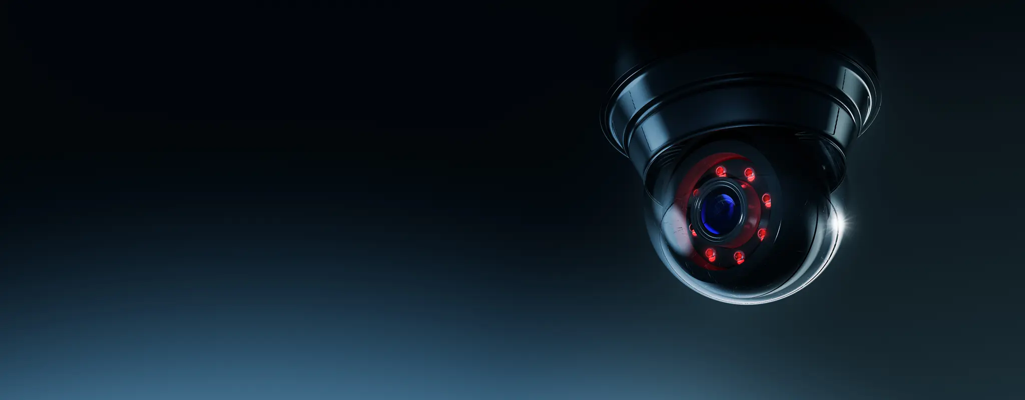 (3D rendering, illustration) High contrast image of a surveillance camera on a dark background